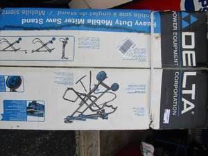 lot 46 image: Delta heavy duty mobile miter saw stand in original box