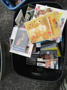 lot 52 image: Large lot of country music cds-- VHS. tapes of all kinds-- dvd movies of all kinds some of the names are in the pictures