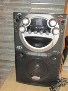 lot 70 image: GPX karaoke machine with cord, has cd and tape player