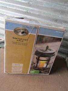 lot 87 image: Hampton Bay 4 pack solar path light set