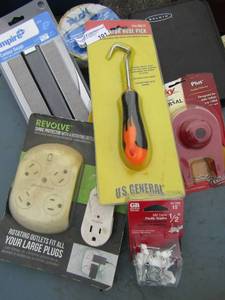 lot 101 image: light plugs- hose pic- surge protector- cartridge stripper and more