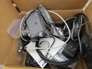 lot 112 image: Panasonic recorder with plus, various computer items plus a Netgear Wi-Fi router with plug