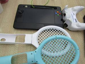 lot 121 image: I DRAW Game tablet in original box, WIIi controller- 2 tennis rackets