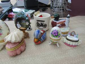 lot 141 image: Lot of various types of trinkets, eggs, tea pots, purses and more