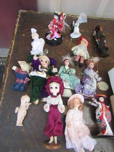 lot 162 image: lot of Indian dolls, American heritage dolls, porcelain baby dolls, bride and groom dolls RAGGEDY ANN, & FOREIGN  dolls