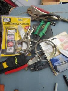 lot 173 image: New professional utility knife, oil filter tool, plyers, ring clamps and more