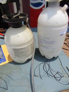 lot 192 image: 2 yard sprayers one has spray end