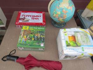 lot 209 image: umbrella, small world globe, ball mason jars with handle, john Deere tractor puzzle
