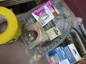 lot 211 image: washer hoses, caution tape, mini compass, swivel hose adjuster and more
