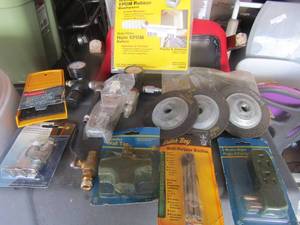 lot 230 image: LOT OF MISC. ITEMS SUCH AS GAUGES, KEY LOCKS, RUBBER MADE GLOVE COMPARTMENT BROOM, GRINDING WHEELS, MULTI PURPOSE BRUSHERS, DOOR AND WINDOW SEAL AND MORE