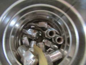 lot 67 image: various coffee cans full of nuts,bols,washers, lug nuts and more