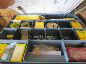 lot 69 image: small clear storage container full of starrett bi-metal hole saw various sizes