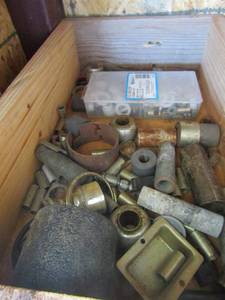 lot 76 image: wooden crate of various size bushings