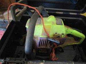 lot 103 image: Poulan  chainsaw in case