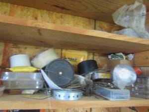 lot 130 image: various types of tape, spark plugs, chains and more