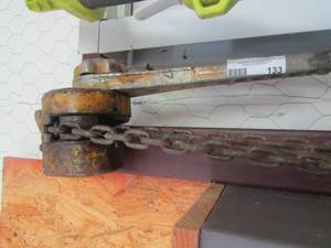 lot 133 image: kind of tow chain with a crank