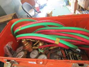 lot 135 image: orange tool box with welding hoses and gauges