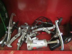 lot 142 image: utility light and various size clamps ( in the red tool box)