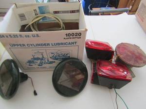 lot 149 image: various break and tail lights for unknown vehicle, 2 solar lights