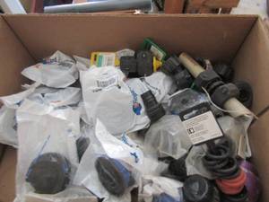 lot 151 image: replacement weed eater part with string, hose washers, and more