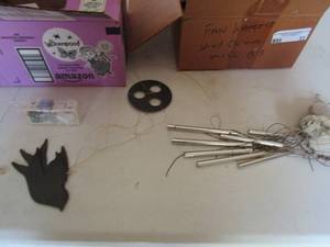 lot 33 image: wind chimes and wind chime pieces and curtain rod installation kits