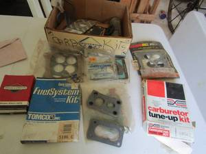 lot 164 image: carburetor turn up kit, various gaskets, fuel system kit