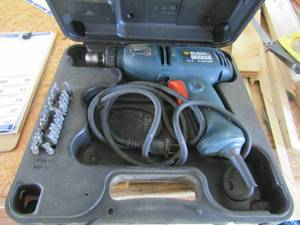 lot 47 image: BLACK & DECKER 4.5 amp drill with all bit ends in case