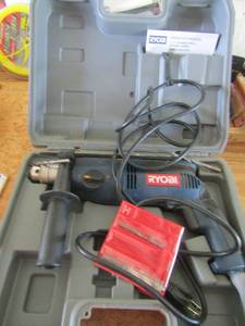 lot 51 image: ryobi  12 in hammer drill variable speed