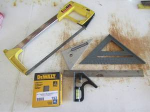 lot 193 image: DeWalt finish nails, hand saw Stanley, various levels