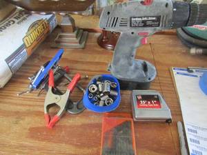 lot 230 image: measuring tape, cordless drilldriver, various sockets, drill bits and more