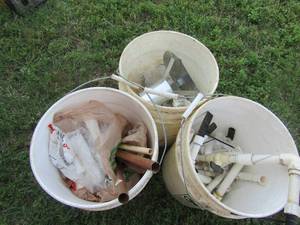 lot 233 image: 3 buckets of copper pieces and pvc piping