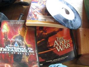 lot 264 image: dvds- African queen, NATIONAL TREASURE 2, , 45record  by bottle neck