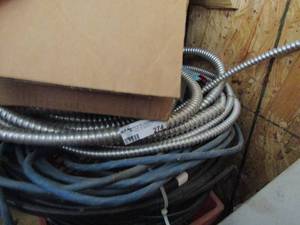 lot 274 image: wiring, conduit,  extension cord and power supply cord