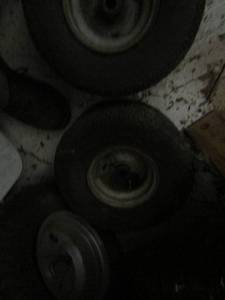 lot 276 image: 3 riding lawn mower  wheels  15 by 6 quantity 2,  &  18 by 9.50
