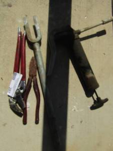 lot 287 image: grease gun, TIE ROD TOOL and pliers