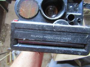 lot 306 image: POLAROID PRONTO LAND CAMERA,  FRAMES  AND FRAMED UKE