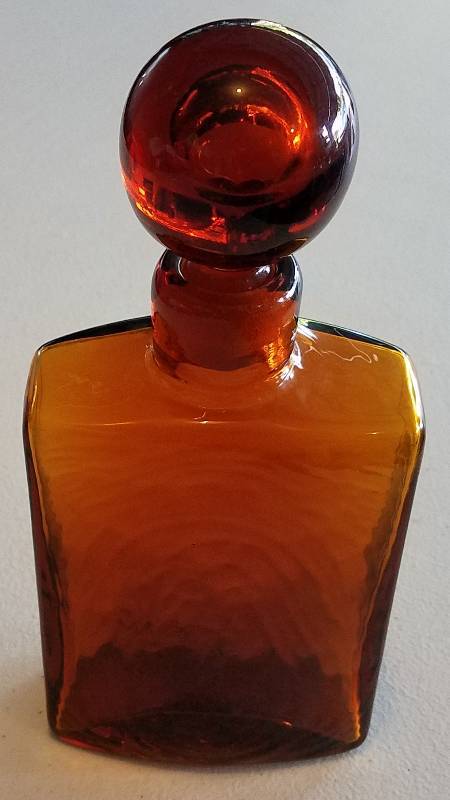 lot 40 image: VINTAGE AMBER GLASS BOTTLE