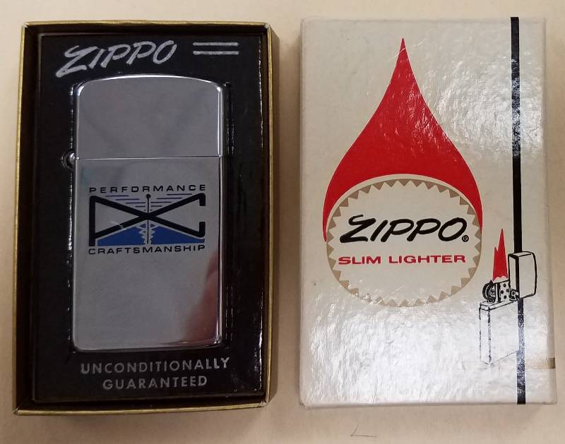 lot 64 image: VINTAGE ZIPPO SLIM LIGHTER IN ORIGINAL BOX