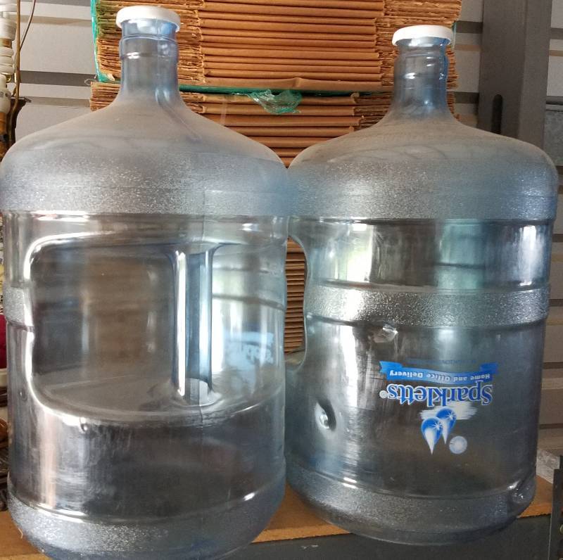 lot 70 image: FIVE GALLON PLASTIC WATER JUGS