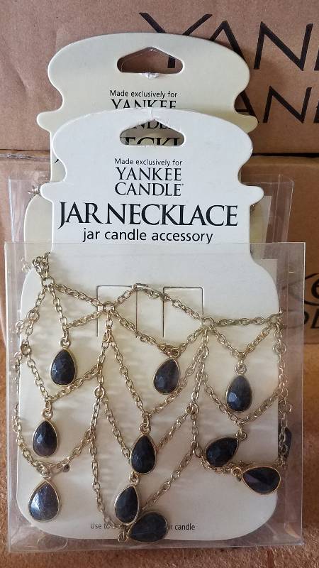 lot 54 image: NEW YANKEE CANDLE JAR JEWELRYNECKLACES