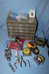 lot 156 image: Small Pars Cubby Bin, Stud Finder, 14 Steel Stamping Set and more