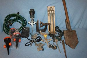 lot 159 image: Foldable Shovel, Variety of Lawn Sprinklers, Tent Stakes, Electric Timer etc.