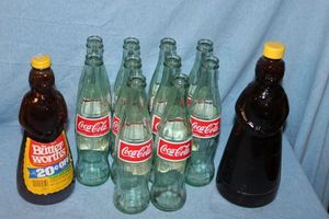 lot 161 image: 10 Coca-Cola Bottles and 2 Vintage Mrs ButterWorth Bottles
