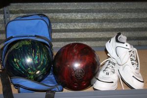 lot 147 image: 2 Bowling Balls and Size 12 Brunswick Bowling Shoes