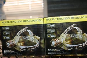 lot 132 image: 2 Headband Lights in box - New