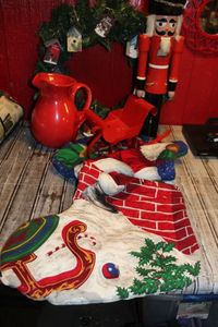 lot 17 image: Christmas Wreath and other Decorative Items,, Large Stocking and Red Pitcher with Deco Sled