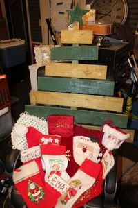 lot 60 image: Wooden Yard Tree and Selection of Various Types of Stockings