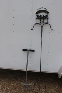 lot 35 image: Lawn Deco and Hand Dirt Tiller