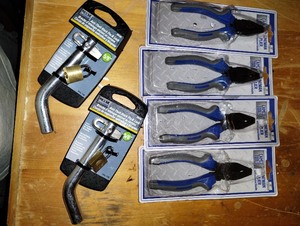 lot 80 image: Six Pair of Lineman Pliers and Two Security Pin and Lock  unopened