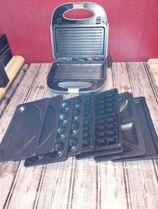 lot 115 image: Big Boss food maker with several different plate attachments to cook several different types of food items lets keep it healthy